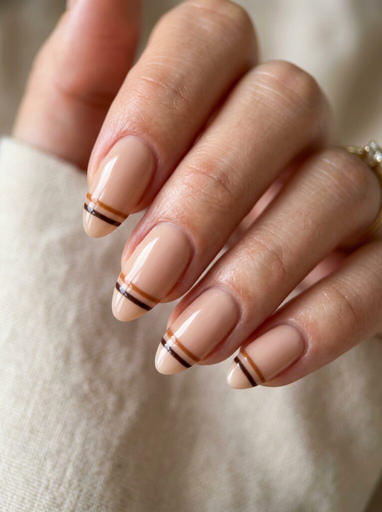 almond nails with brown caramel 202607141101