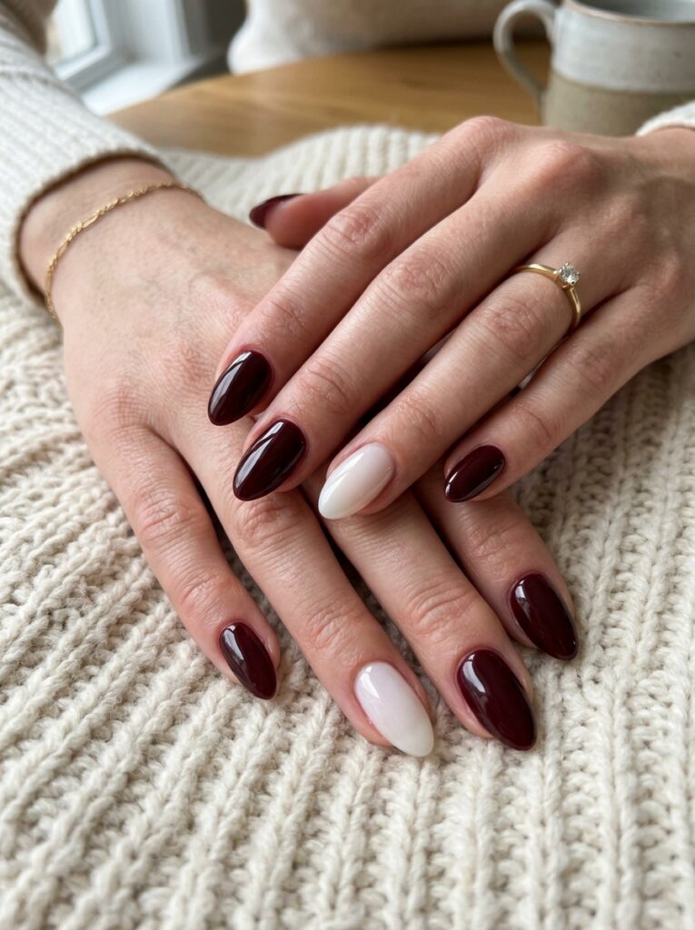 22 Burgundy Nail Ideas: How to Wear Fall's It Color burgundy nails with milky accent nail