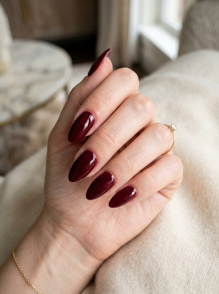 22 Burgundy Nail Ideas: How to Wear Fall's It Color classic glossy burgundy nails almond shape