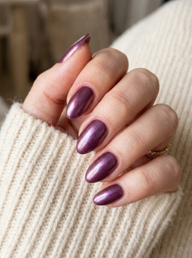 20 Stunning Plum Nail Ideas You'll Want to Save This Fall plum glazed donut nails pearl finish