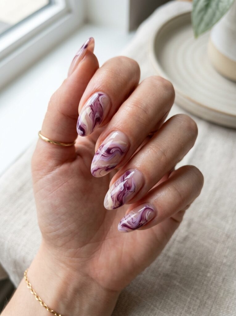 20 Stunning Plum Nail Ideas You'll Want to Save This Fall plum swirl nails marbled design
