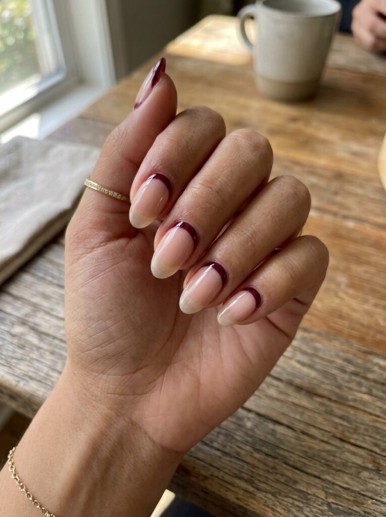 22 Burgundy Nail Ideas: How to Wear Fall's It Color reverse french burgundy halo manicure