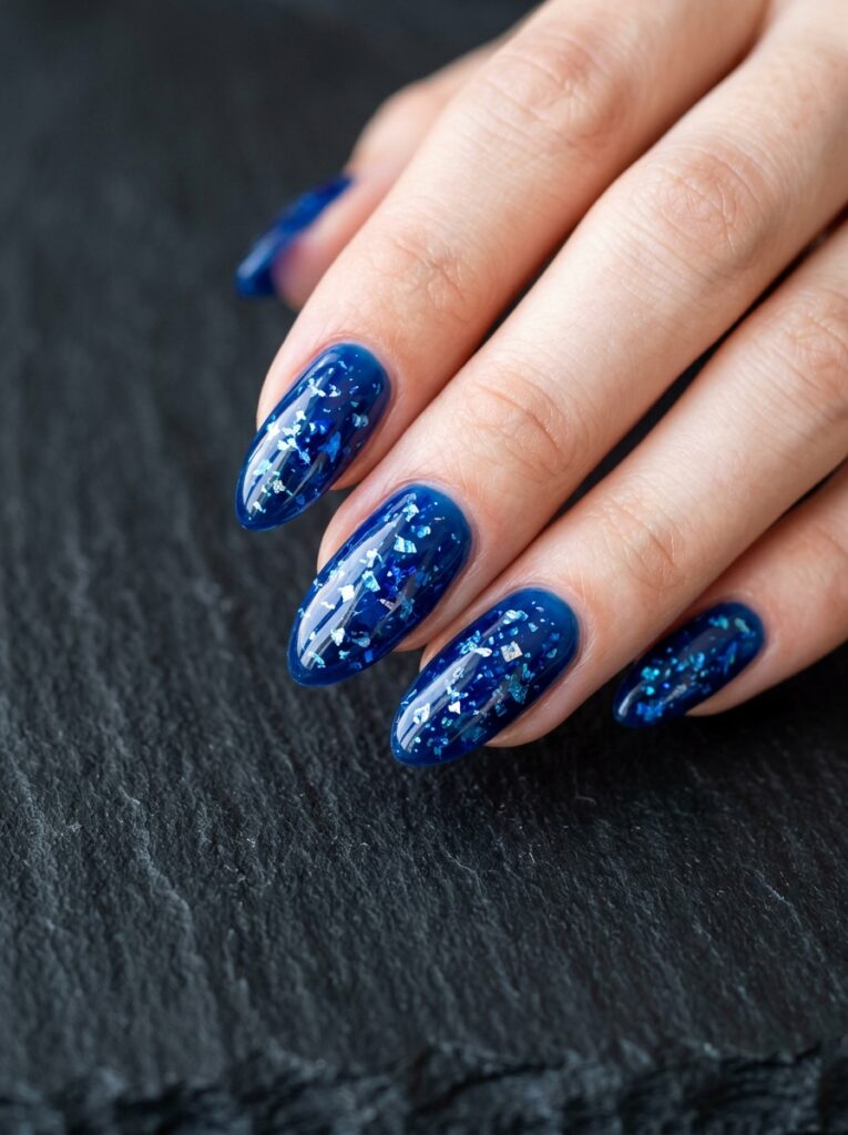 cobalt blue jelly nails with foil flakes