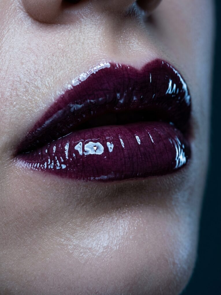 midnight plum lip with clear vinyl gloss