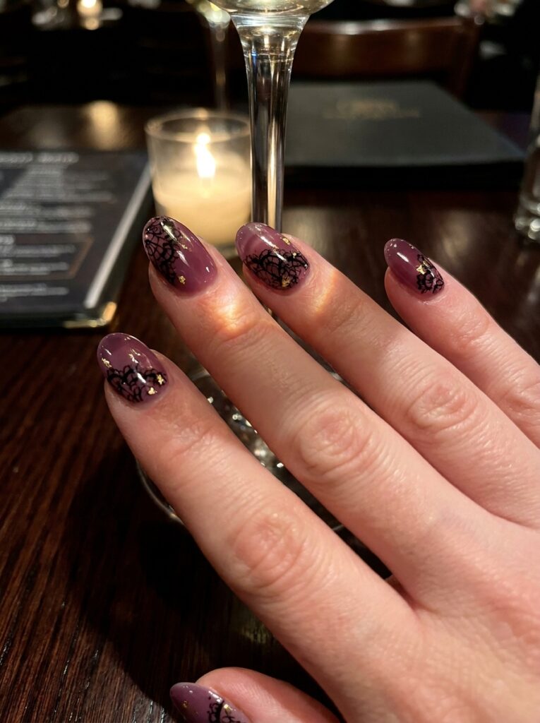 plum jelly nails with black lace and gold leaf