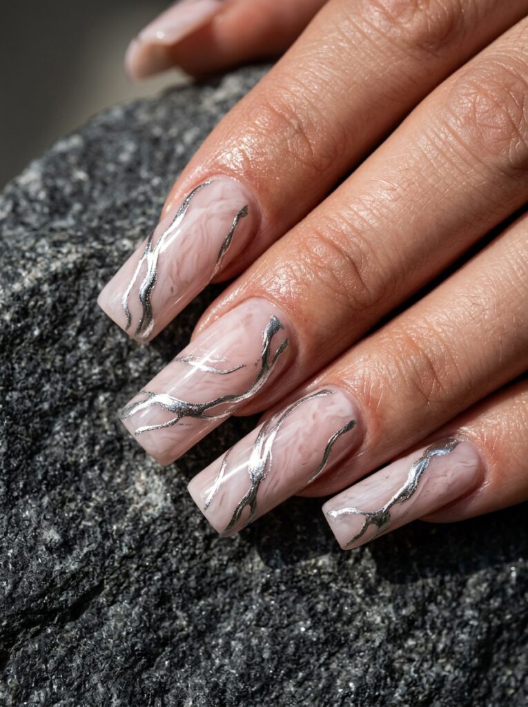 molten silver and blush marble nails with liquid veining