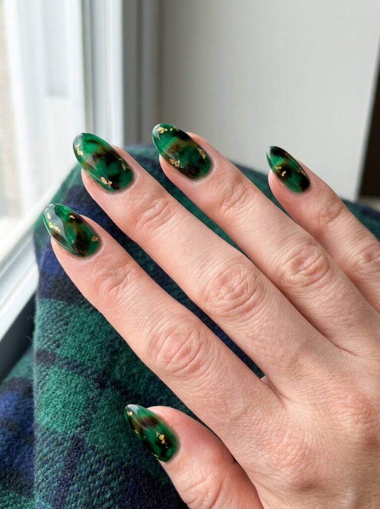 emerald and black tortoiseshell nails with gold foil