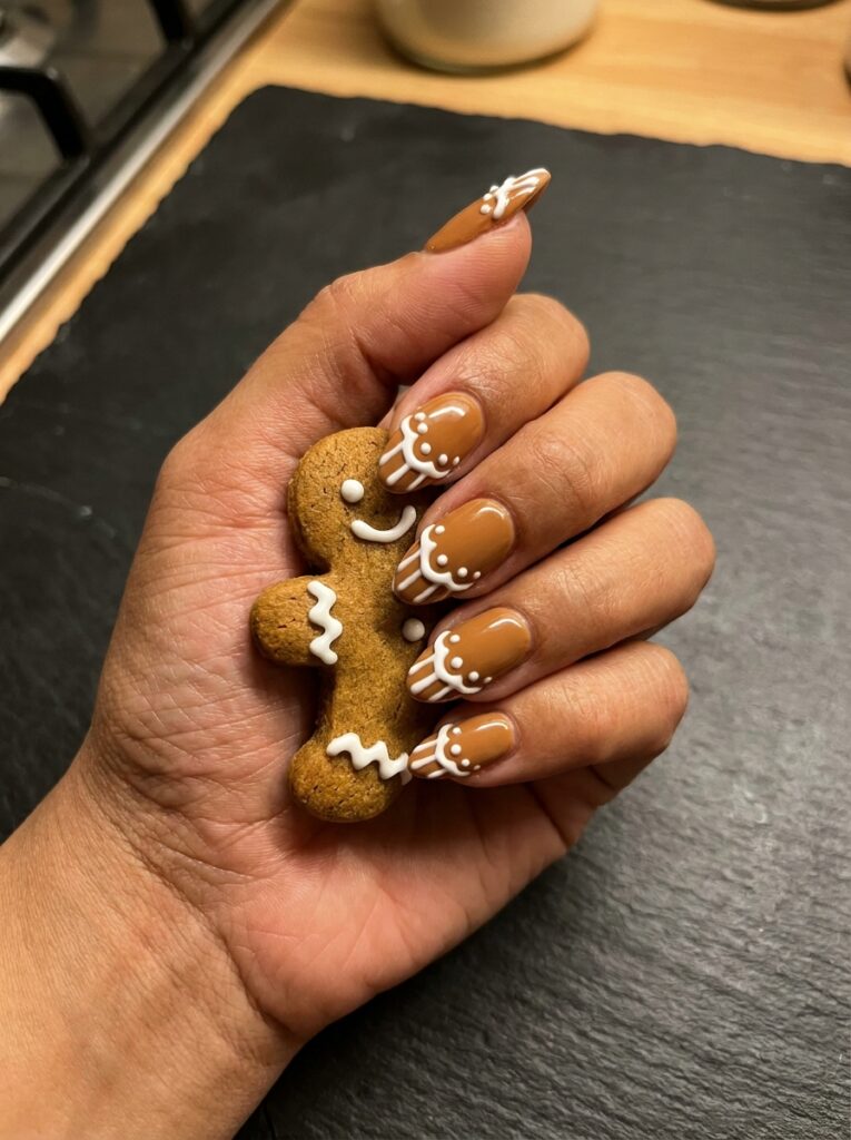 caramel brown gingerbread nails with piped white icing