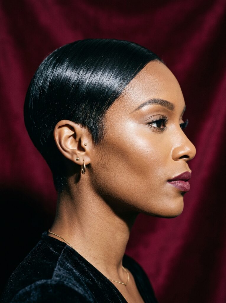 sleek glossy black pixie cut